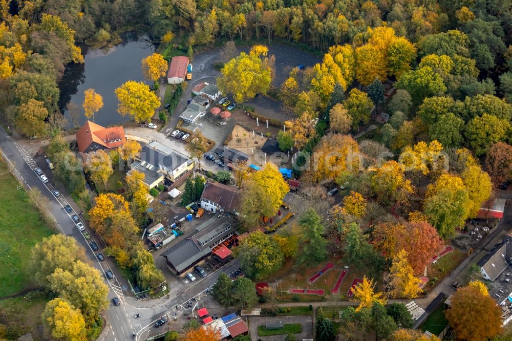 Aerial image Bottrop - Autumnal discolored vegetation view Tables and benches of open-air restaurants Zur Grafenmuehle in Bottrop in the state North Rhine-Westphalia, Germany