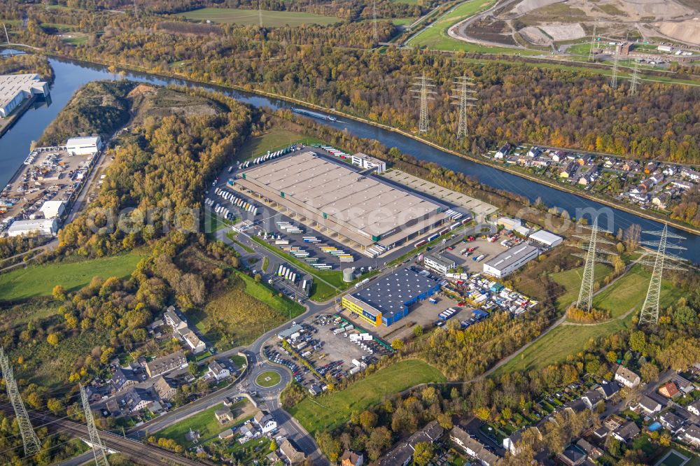 Herne from above - Autumnal discolored vegetation view building complex and grounds of the logistics center of Duvenbeck Consulting GmbH & Co. KG on Schlossstrasse in Herne in the state North Rhine-Westphalia, Germany