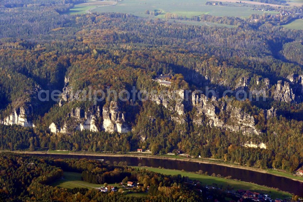 Aerial photograph Rathen - Autumnal discolored vegetation view rock massif and rock formation Bastion in the Elbe Sandstone Mountains in Rathen in the state Saxony, Germany