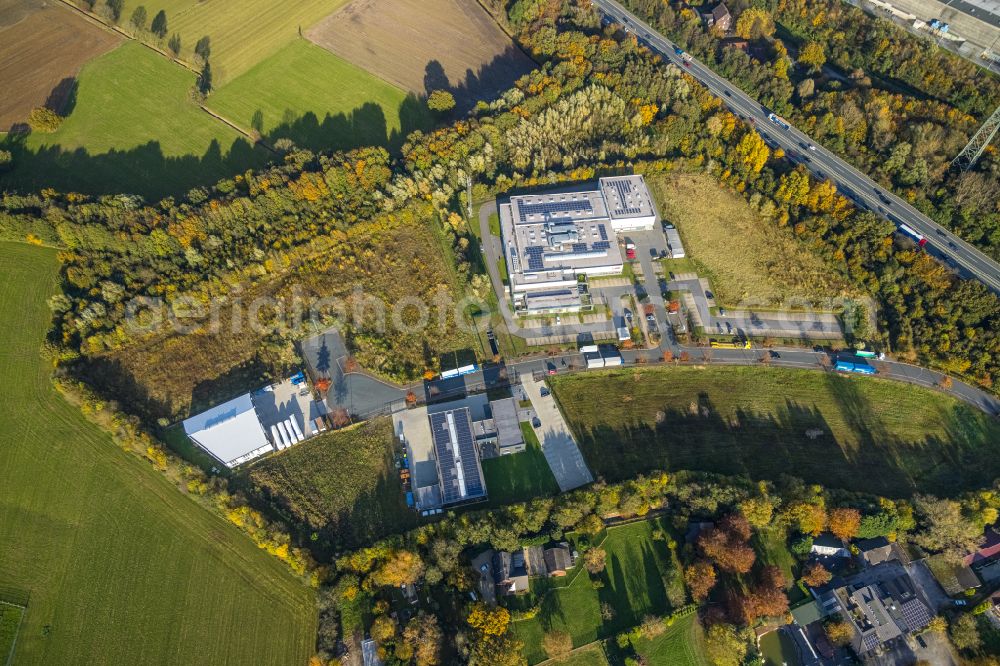 Aerial image Gladbeck - Autumnal discolored vegetation view industrial estate and company settlement on street Heinrich-Hertz-Strasse in Gladbeck at Ruhrgebiet in the state North Rhine-Westphalia, Germany