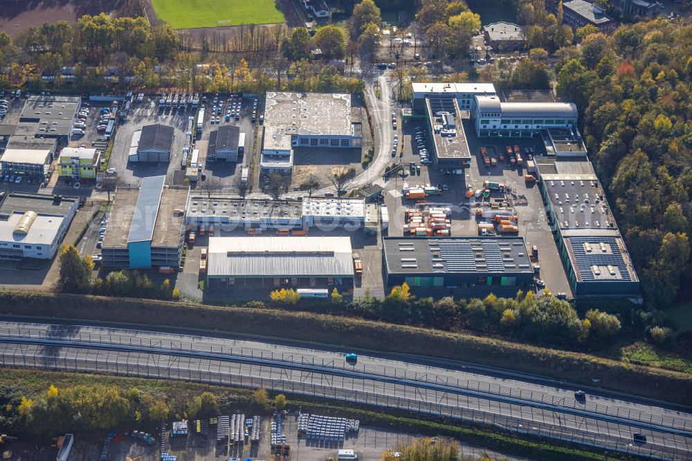 Aerial photograph Bochum - Autumnal discolored vegetation view industrial estate and company settlement on Markstrasse in the district Querenburg in Bochum at Ruhrgebiet in the state North Rhine-Westphalia, Germany