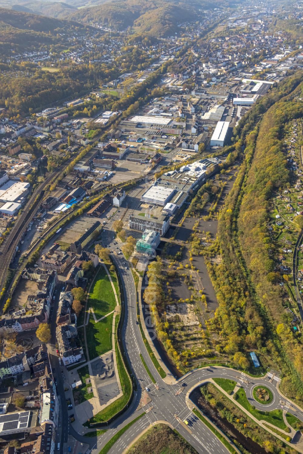 Hagen from the bird's eye view: Autumnal discolored vegetation view industrial estate and company settlement in the district Haspe in Hagen at Ruhrgebiet in the state North Rhine-Westphalia, Germany