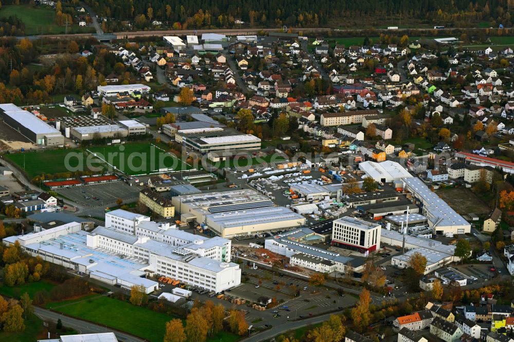 Rehau from above - Autumnal discolored vegetation view industrial estate and company settlement on Sonnenstrasse - Zehstrasse in Rehau in the state Bavaria, Germany