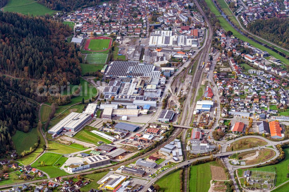 Hausach from above - Autumnal discolored vegetation view station railway building of the Deutsche Bahn Gleisanlagen Hausach in Kinzigtal in Hausach in the state Baden-Wurttemberg, Germany