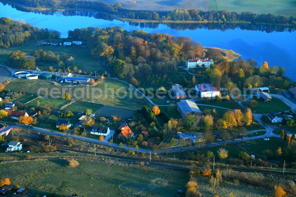 Cammin from the bird's eye view: Autumnal discolored vegetation view Building and manor house of the farmhouse in Cammin in the state Mecklenburg - Western Pomerania, Germany