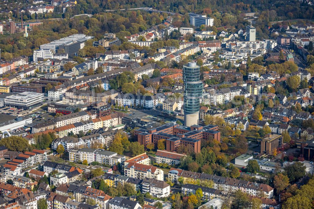 Bochum from above - Autumnal discolored vegetation view skyscraper Exenterhouse - Exenterhaus on a former bunker at the University Street in Bochum, North Rhine-Westphalia, Germany