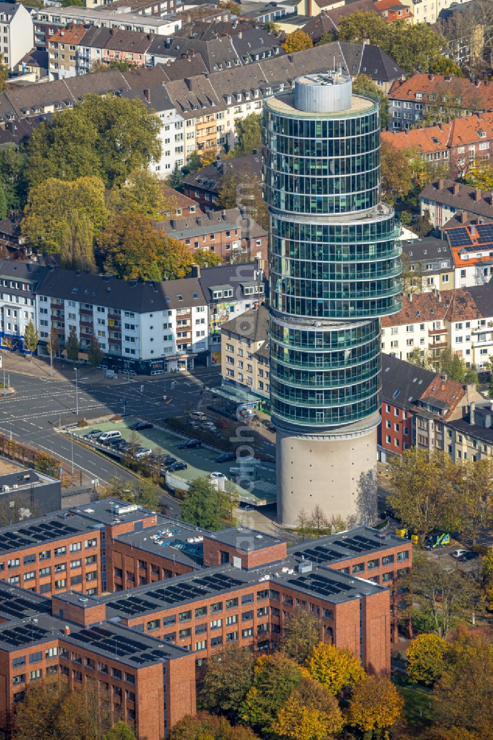 Aerial image Bochum - Autumnal discolored vegetation view skyscraper Exenterhouse - Exenterhaus on a former bunker at the University Street in Bochum, North Rhine-Westphalia, Germany