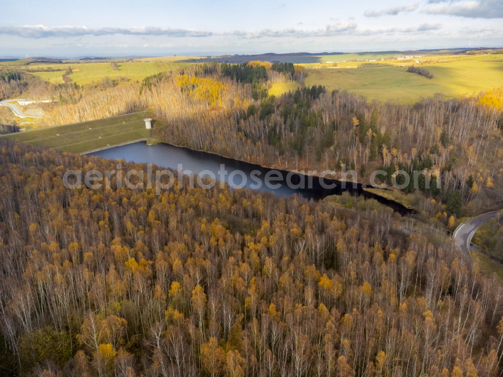 Aerial image Altenberg - Autumnal colored vegetation view of the Lauenstein flood retention basin in Altenberg in the state of Saxony, Germany