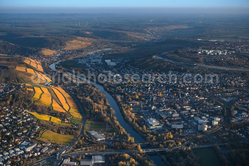 Würzburg from the bird's eye view: Autumnal discolored vegetation view cityscape of the district on the banks of the Main river in the district Heidingsfeld in Wuerzburg in the state Bavaria, Germany