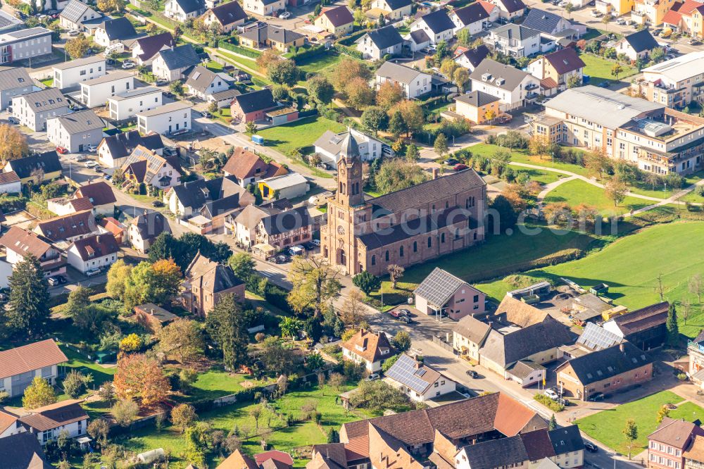 Aerial photograph Mahlberg - Autumnal discolored vegetation view church building in the village of in Mahlberg in the state Baden-Wuerttemberg, Germany