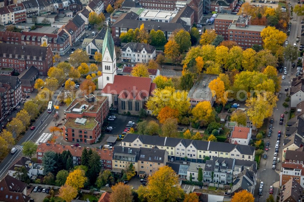 Aerial image Gladbeck - Autumnal discolored vegetation view at the church building Christus Kirche in Gladbeck in the state North Rhine-Westphalia, Germany