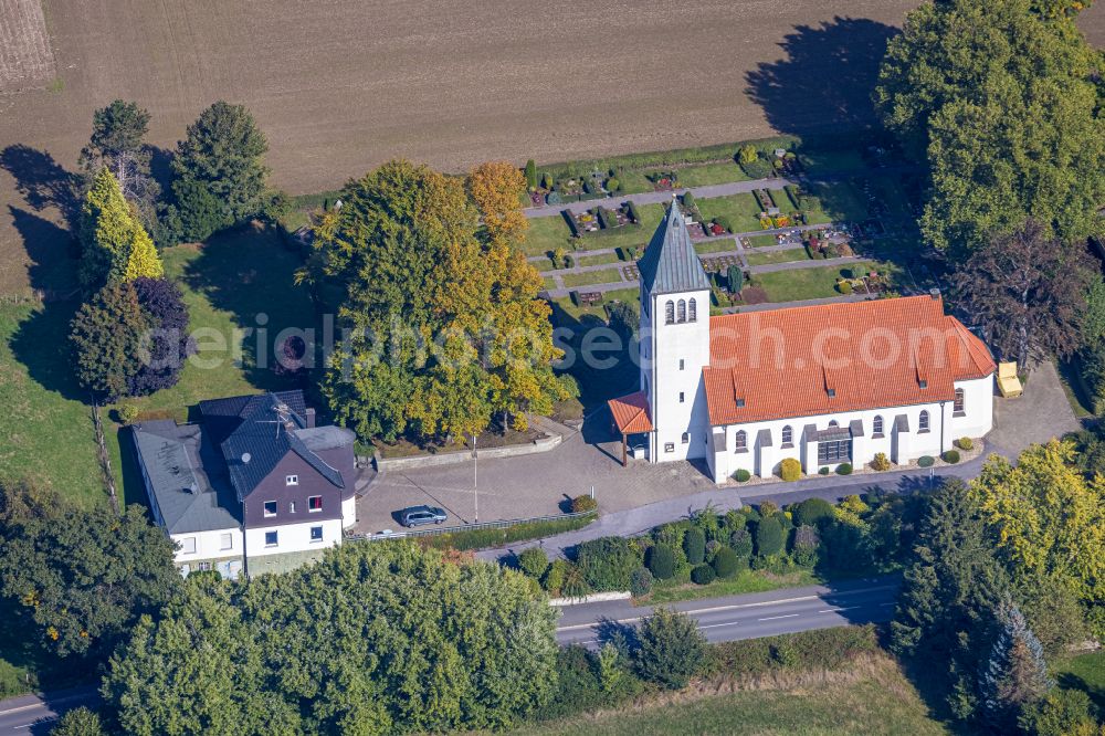 Frohnhausen from the bird's eye view: Autumnal discolored vegetation view church building Katholische Kirchengemeinde Christ-Koenig Warmen in Frohnhausen at Sauerland in the state North Rhine-Westphalia, Germany