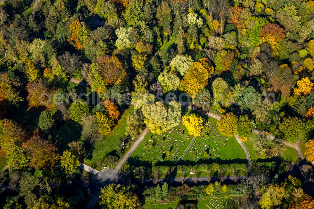 Bochum from above - Autumnal discolored vegetation view crematory and funeral hall for burial in the grounds of the cemetery Zentralfriedhof on street Immanuel-Kant-Strasse - Freigrafendamm in Bochum at Ruhrgebiet in the state North Rhine-Westphalia, Germany