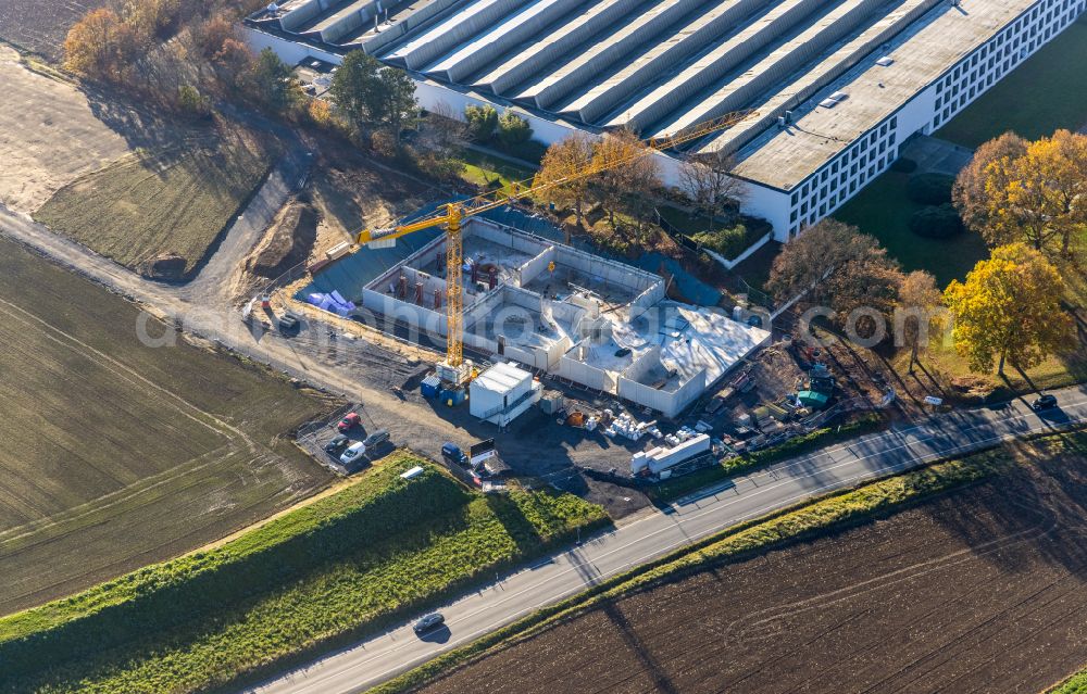 Aerial photograph Menden (Sauerland) - Autumnal discolored vegetation new building on view company grounds and facilities of BEGA Gantenbrink-Leuchten KG in Menden (Sauerland) at Sauerland in the state North Rhine-Westphalia, Germany