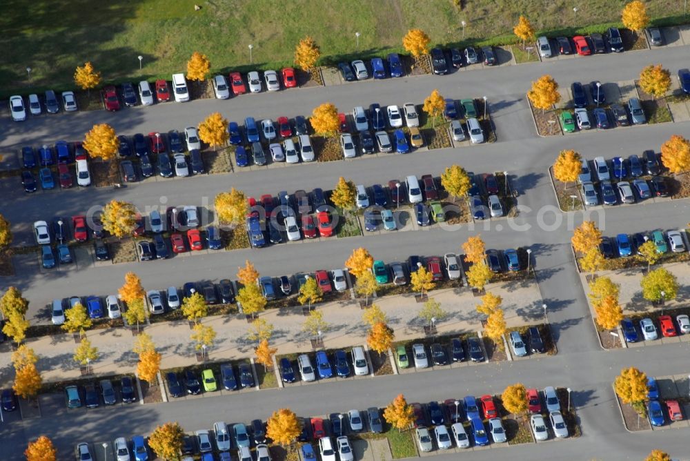 Dresden from the bird's eye view: Autumnal discolored vegetation view parking and storage space for automobiles on OSH Offiziersschule of Heeres of Bunofwehr in the district Albertstadt in Dresden in the state Saxony, Germany