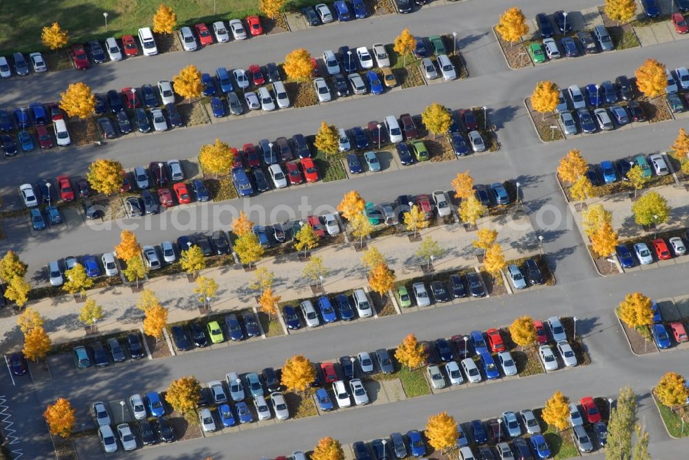 Aerial image Dresden - Autumnal discolored vegetation view parking and storage space for automobiles on OSH Offiziersschule of Heeres of Bunofwehr in the district Albertstadt in Dresden in the state Saxony, Germany