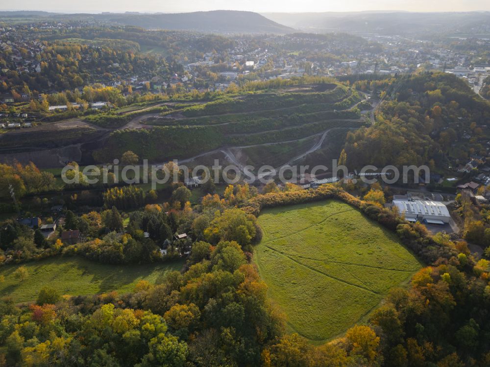 Dresden from above - Autumnal discolored vegetation view Rock massif and rock formation in front of the remains of the prehistoric fortification Heidenschanze at Plauenschen Grund in the district of Coschuetz in Dresden in the federal state of Saxony, Germany