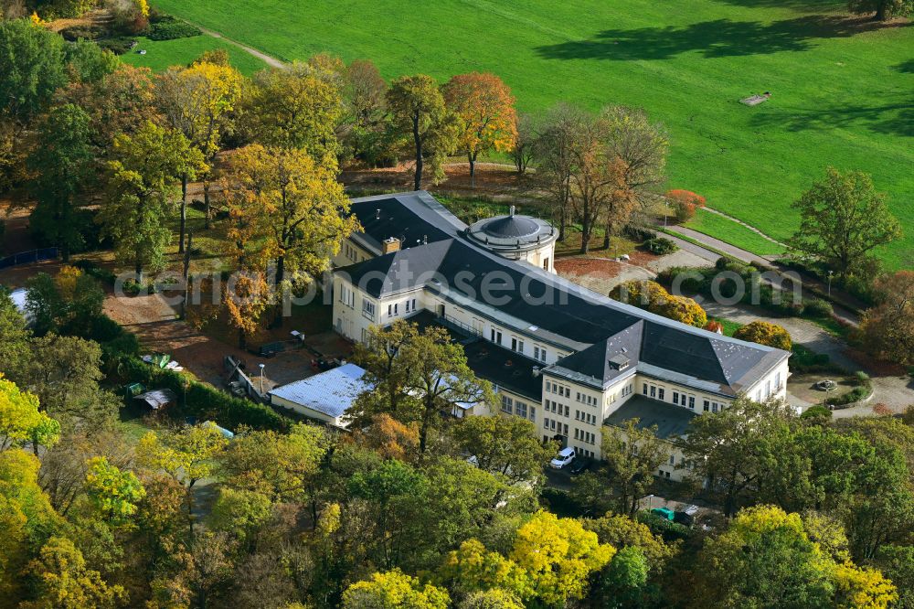 Aerial image Leipzig - Autumnal discolored vegetation view castle Parkschloss Agra in the Agra-Park in the district Doelitz in Leipzig in the state Saxony, Germany