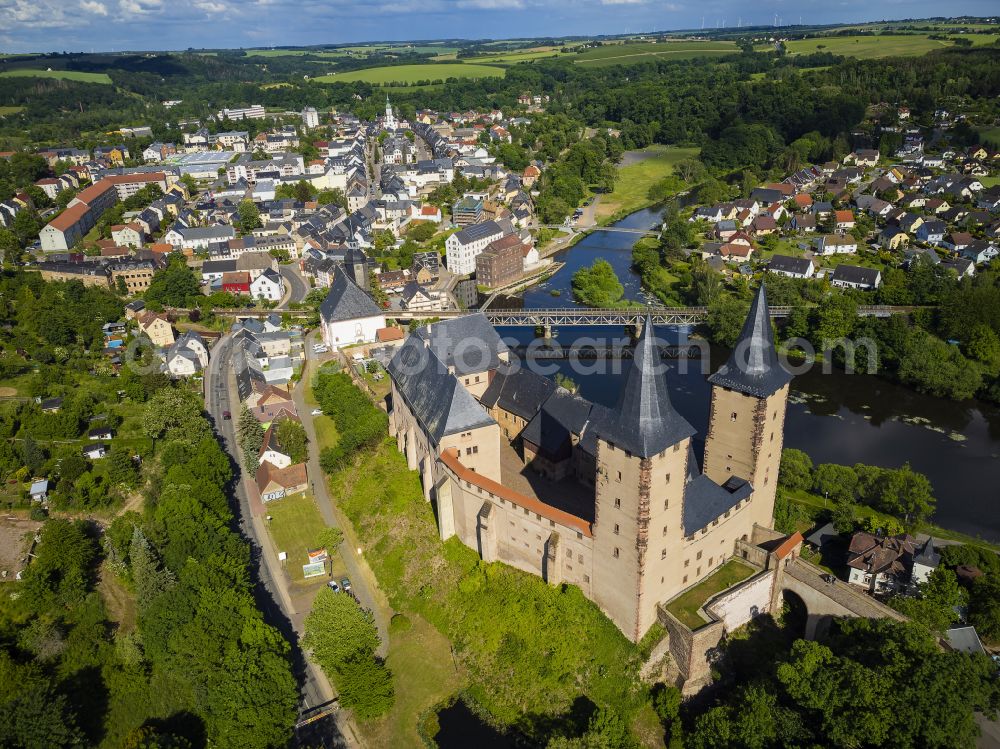 Rochlitz from the bird's eye view: Autumnal colored vegetation view of Rochlitz Castle in Rochlitz on the river Mulde in the state of Saxony, Germany