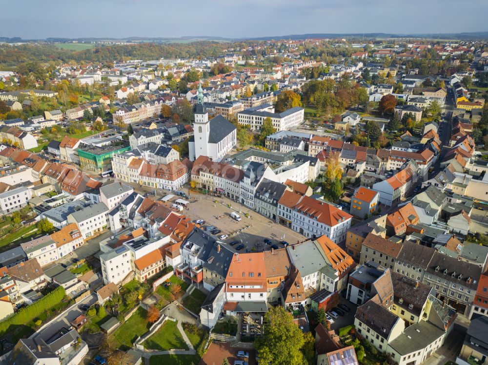 Frankenberg/Sa. from the bird's eye view: Autumnal colored vegetation view of the St. Aegidien Church, city center in the inner city area in Frankenberg/Sa. in the federal state of Saxony, Germany