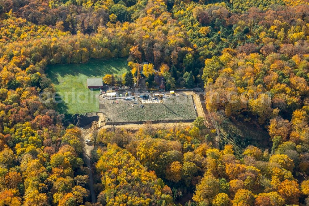 Duisburg from above - Autumnal discolored vegetation view Civil engineering works in the wild boar enclosure in the Duisburg municipal forest in Duisburg in the federal state of North Rhine-Westphalia, Germany