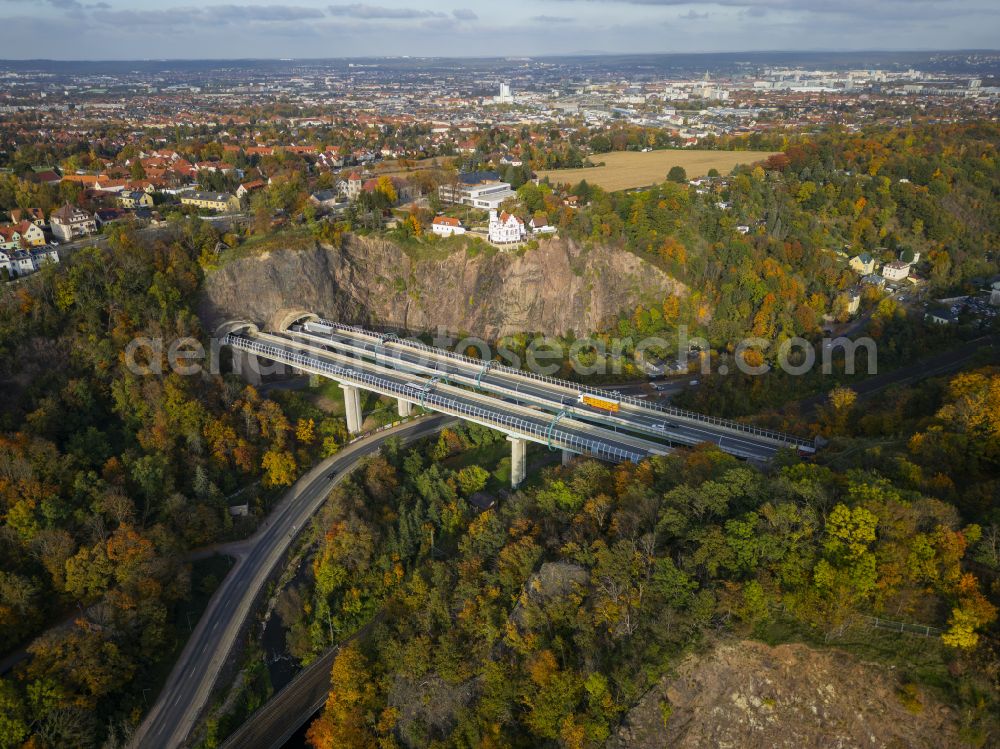 Aerial image Dresden - Autumnal discolored vegetation view routing and lanes in the course of the motorway bridge structure of the BAB A 17 Weisseritztalbruecke on street Weisseritztalbruecke in the district Coschuetz in Dresden in the state Saxony, Germany