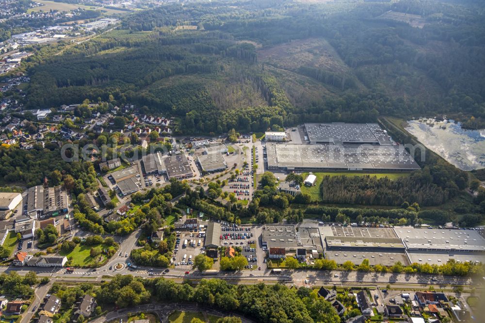 Menden (Sauerland) from above - Autumnal discolored vegetation view building and production halls on the premises Kludi GmbH & Co. KG in Menden (Sauerland) at Sauerland in the state North Rhine-Westphalia, Germany