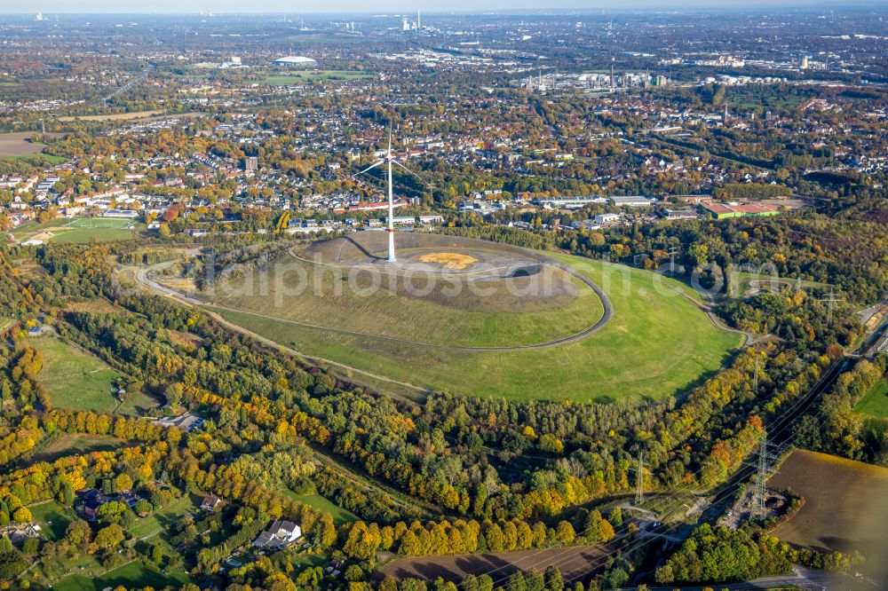 Aerial image Gladbeck - Autumnal discolored vegetation view wind turbine installation on the overburden dump hill of the Mottbruchhalde in Gladbeck at Ruhrgebiet in the state North Rhine-Westphalia, Germany