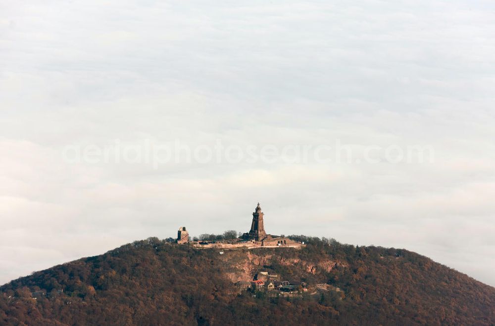 Steinthaleben from the bird's eye view: Herbstwetter mit Hochnebel - Wolkendecke am Kyffhäuserdenkmal bei Steinthaleben in Thüringen. Das Kyffhäuserdenkmal (auch Barbarossadenkmal oder Kaiser-Wilhelm-Denkmal) auf der Kuppe des Kyffhäuserberges wurde 1890 bis 1896 zu Ehren von Kaiser Wilhelm I. errichtet. Es ist das drittgrößte Denkmal Deutschlands. Autumn weather with high fog - cloud cover at the Kyffhäuser monument at Steinthaleben in Thuringia. The Kyffhäuser monument (also Barbarossa Monument or Kaiser-Wilhelm-monument) on the top of the Mount Kyffhäuser was built from 1890 to 1896 in honor of Kaiser Wilhelm I.. It is the third largest monument in Germany.