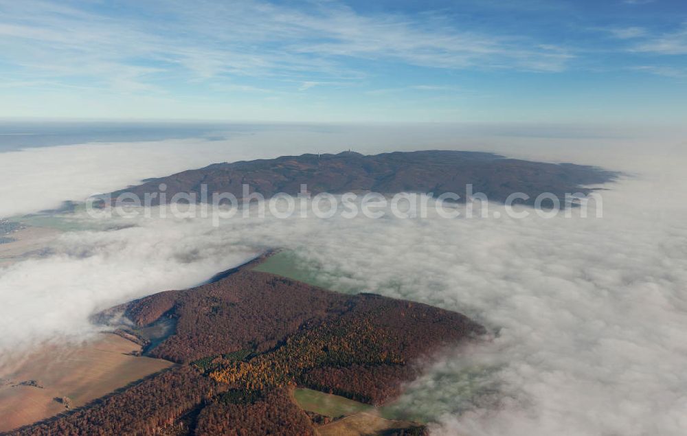 Steinthaleben from above - Herbstwetter mit Hochnebel - Wolkendecke am Kyffhäuserdenkmal bei Steinthaleben in Thüringen. Das Kyffhäuserdenkmal (auch Barbarossadenkmal oder Kaiser-Wilhelm-Denkmal) auf der Kuppe des Kyffhäuserberges wurde 1890 bis 1896 zu Ehren von Kaiser Wilhelm I. errichtet. Es ist das drittgrößte Denkmal Deutschlands. Autumn weather with high fog - cloud cover at the Kyffhäuser monument at Steinthaleben in Thuringia. The Kyffhäuser monument (also Barbarossa Monument or Kaiser-Wilhelm-monument) on the top of the Mount Kyffhäuser was built from 1890 to 1896 in honor of Kaiser Wilhelm I.. It is the third largest monument in Germany.