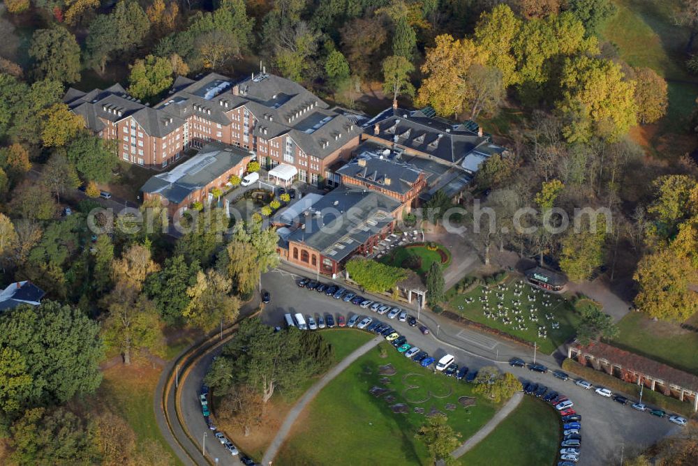 Aerial photograph Magdeburg - Blick auf das Herrenkrug Parkhotel an der Elbe in Magdeburg. Das Parkhotel bietet eine gelungene Symbiose von Historie und Moderne - liebevoll restaurierte Jugendstilräume, verbunden mit einem Hotelneubau, eingebettet in den 46 ha großen idyllischen Herrenkrug Park, einem der schönsten Landschaftsparks Deutschlands direkt am malerischen Ufer der Elbe. Kontakt: Herrenkrug GmbH, Herrenkrug Parkhotel an der Elbe, Herrenkrug 3, 39114 Magdeburg, Tel: 0391/85 08 0, Mail: info@herrenkrug.de,