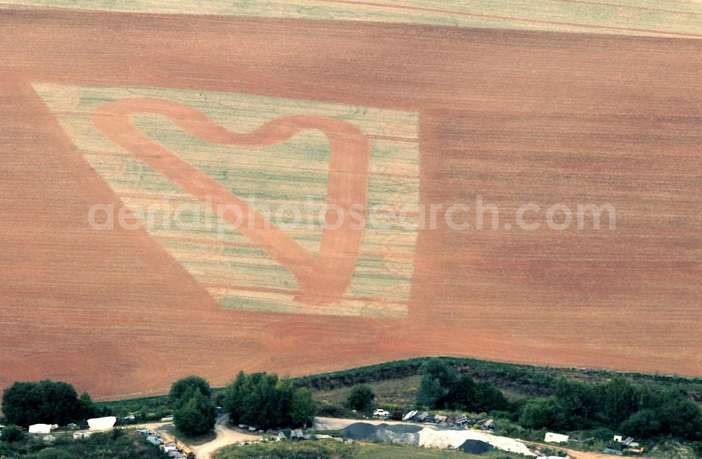 Heilbad Heiligenstadt from above - Heart on a harvested field at Heilbad Heiligenstadt in Thuringia