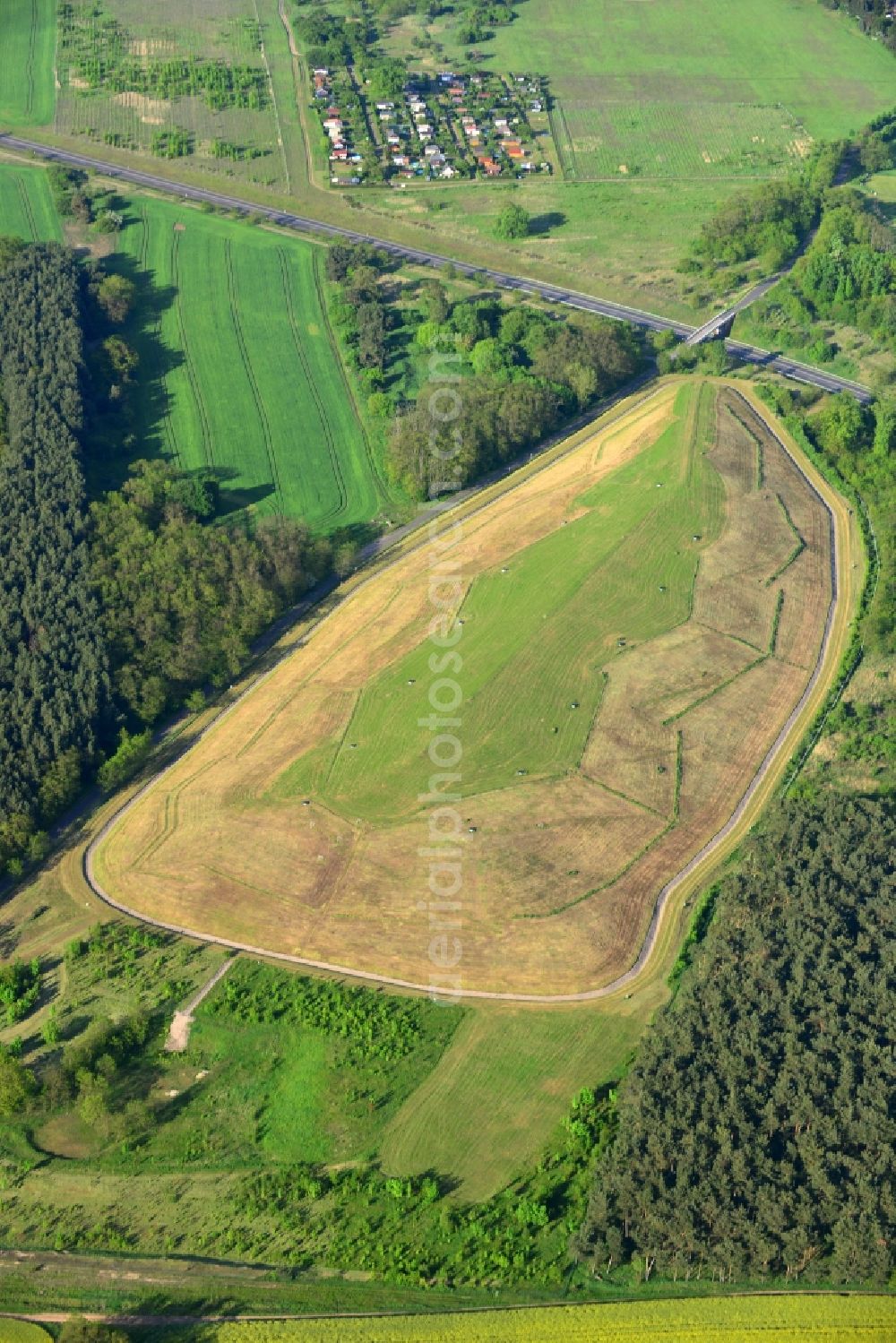 Aerial photograph Wriezen Ortsteil Biesdorf - Hill of renatured dump to a wooded area near the village of Biesdorf, a district of Wriezen in Brandenburg