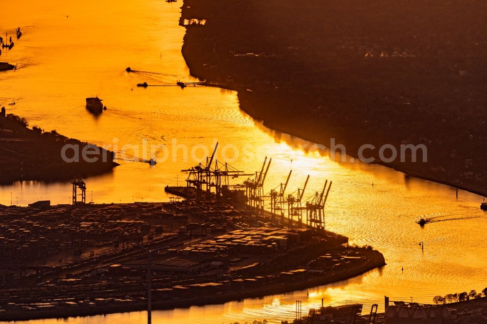 Aerial image Hamburg - HHLA Logistics Container Terminal Burchardkai at the Port of Hamburg in the sunset in Hamburg