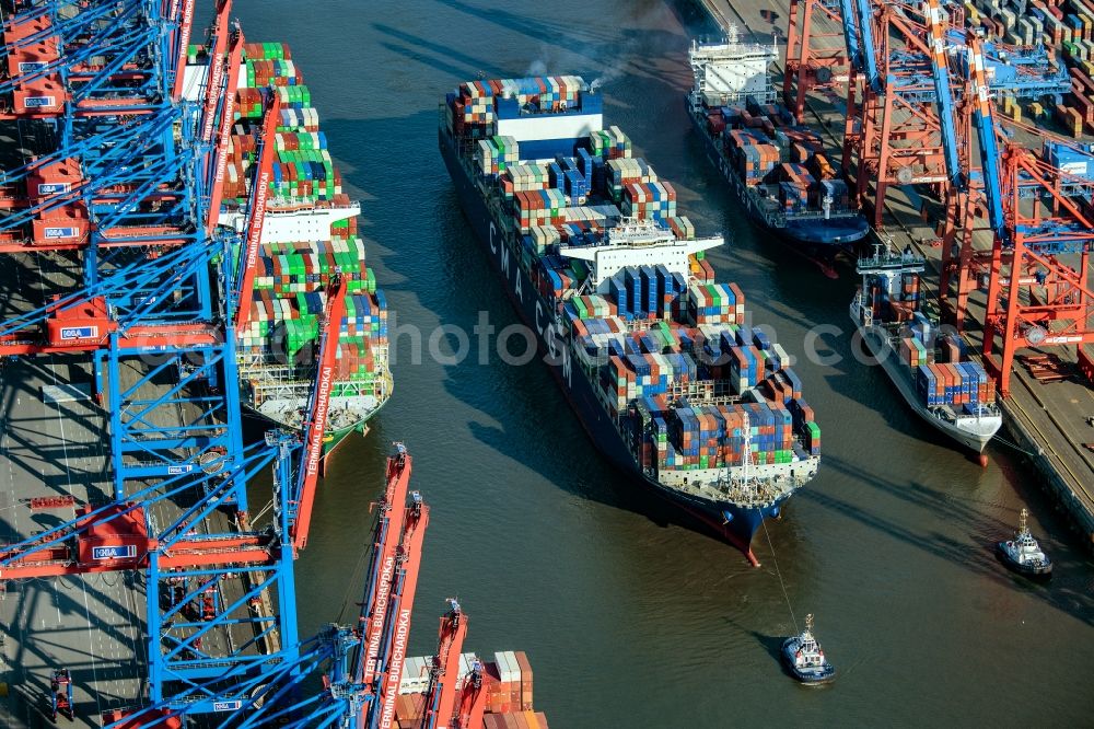 Hamburg from above - HHLA Logistics Container Terminal Burchardkai, a container ship we towed in the Port of Hamburg in Hamburg