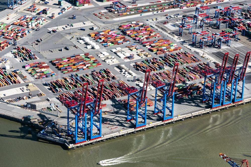 Hamburg from the bird's eye view: View on container and container ships at berth HHLA Logistics Container Terminal Burchhardkai and Walter Hofer Euro Gate Container Terminal in the Port of Hamburg harbor in Hamburg