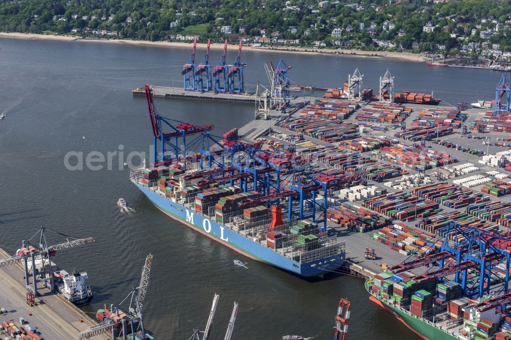 Hamburg from the bird's eye view: View on container and container ships at berth HHLA Logistics Container Terminal Burchhardkai and Walter Hofer Euro Gate Container Terminal in the Port of Hamburg harbor in Hamburg. Containership MOL Triumph