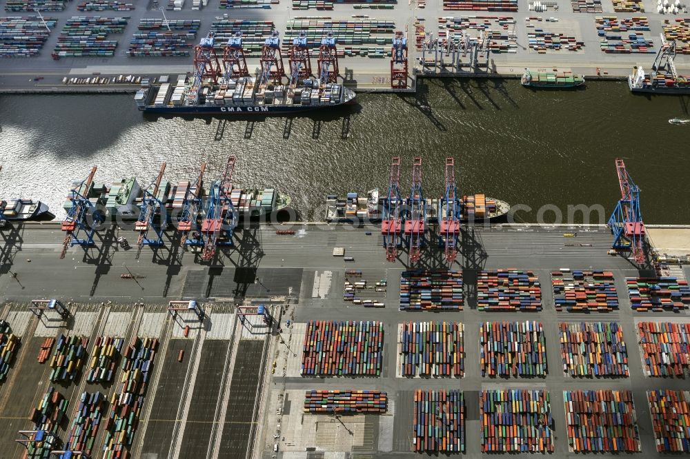 Hamburg from the bird's eye view: View on container and container ships at berth HHLA Logistics Container Terminal Tollerort and Walter Hofer Euro Gate Container Terminal in the Port of Hamburg harbor in Hamburg