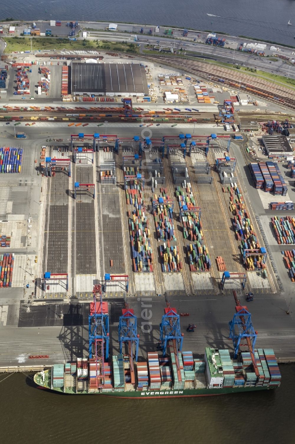 Aerial photograph Hamburg - View on container and container ships at berth HHLA Logistics Container Terminal Tollerort and Walter Hofer Euro Gate Container Terminal in the Port of Hamburg harbor in Hamburg