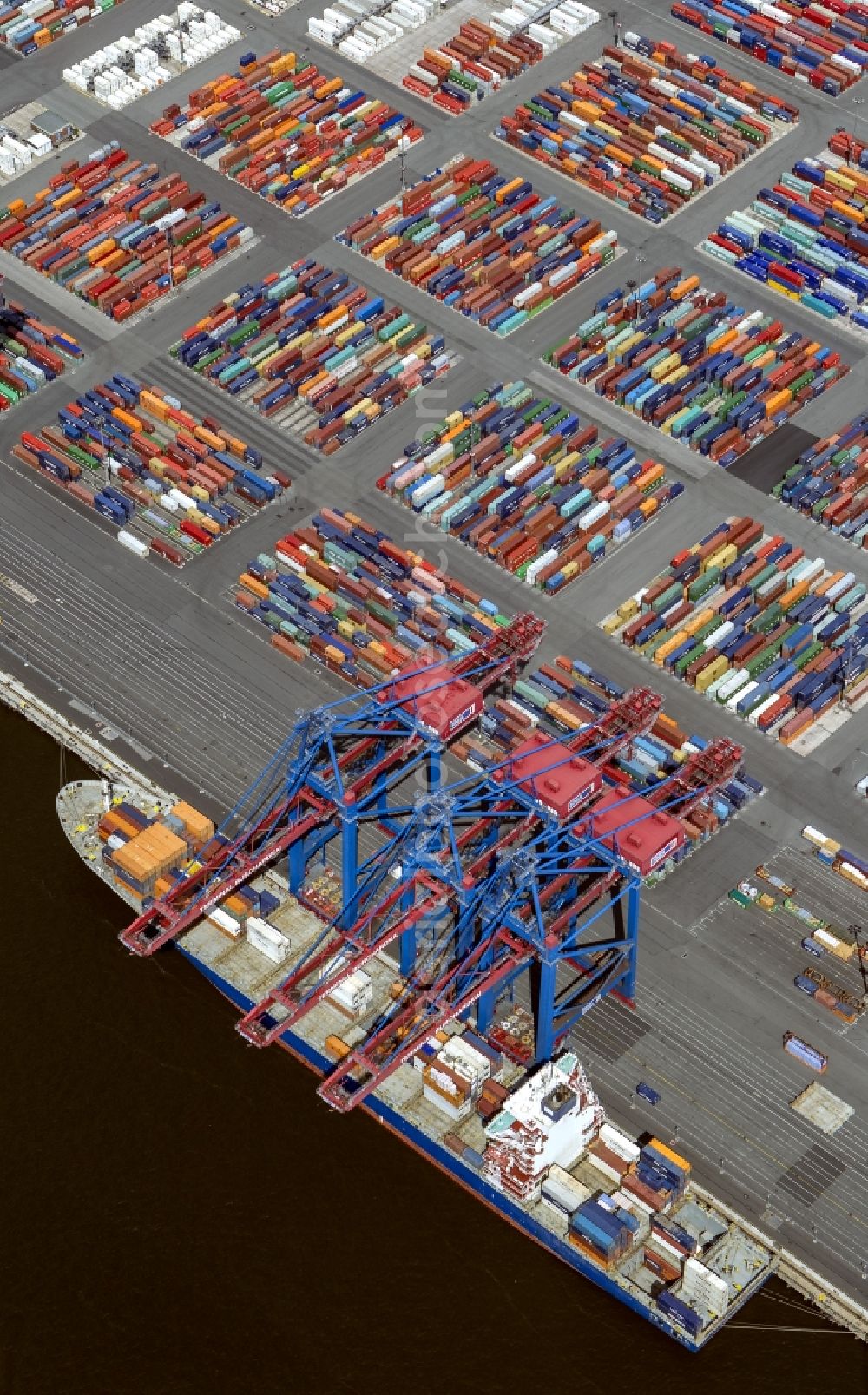 Hamburg from above - View on container and container ships at berth HHLA Logistics Container Terminal Tollerort and Walter Hofer Euro Gate Container Terminal in the Port of Hamburg harbor in Hamburg