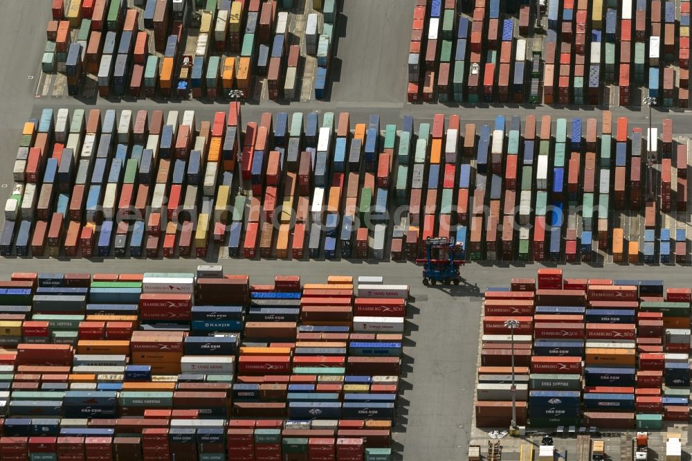 Hamburg from the bird's eye view: View on container and container ships at berth HHLA Logistics Container Terminal Tollerort and Walter Hofer Euro Gate Container Terminal in the Port of Hamburg harbor in Hamburg