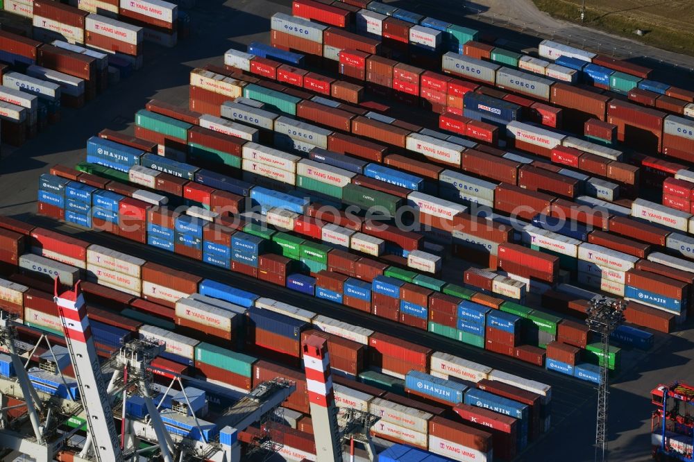 Hamburg from the bird's eye view: View on container and container ships at berth HHLA Logistics Container Terminal Tollerort and Walter Hofer Euro Gate Container Terminal in the Port of Hamburg harbor in Hamburg