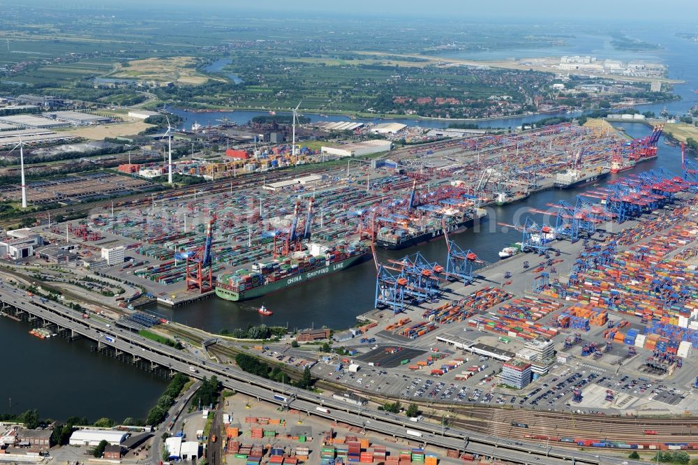 Hamburg from the bird's eye view: View on container and container ships at berth HHLA Logistics Container Terminal Tollerort and Walter Hofer Euro Gate Container Terminal in the Port of Hamburg harbor in Hamburg