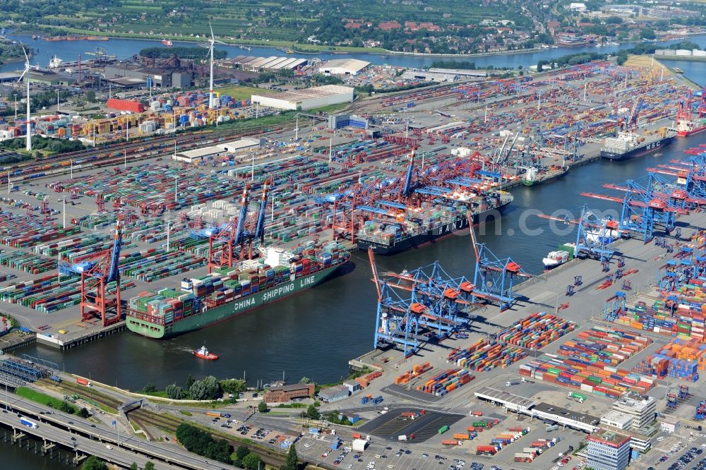 Aerial image Hamburg - View on container and container ships at berth HHLA Logistics Container Terminal Tollerort and Walter Hofer Euro Gate Container Terminal in the Port of Hamburg harbor in Hamburg