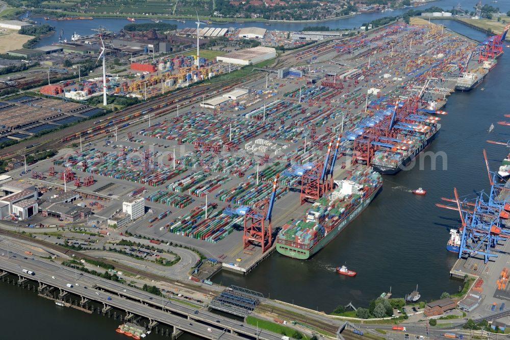 Hamburg from the bird's eye view: View on container and container ships at berth HHLA Logistics Container Terminal Tollerort and Walter Hofer Euro Gate Container Terminal in the Port of Hamburg harbor in Hamburg