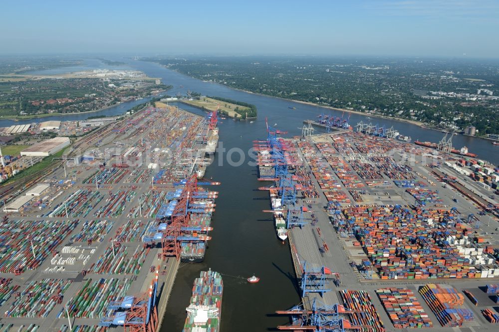 Hamburg from the bird's eye view: View on container and container ships at berth HHLA Logistics Container Terminal Tollerort and Walter Hofer Euro Gate Container Terminal in the Port of Hamburg harbor in Hamburg