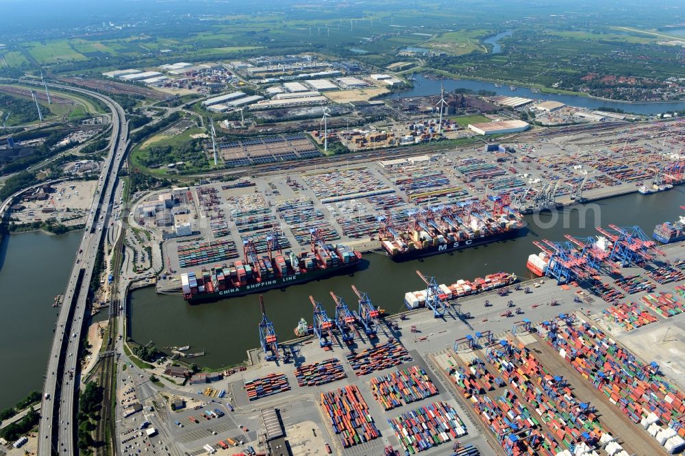 Aerial image Hamburg - View on container and container ships at berth HHLA Logistics Container Terminal Tollerort and Walter Hofer Euro Gate Container Terminal in the Port of Hamburg harbor in Hamburg