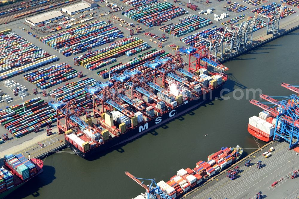 Hamburg from above - View on container and container ships at berth HHLA Logistics Container Terminal Tollerort and Walter Hofer Euro Gate Container Terminal in the Port of Hamburg harbor in Hamburg