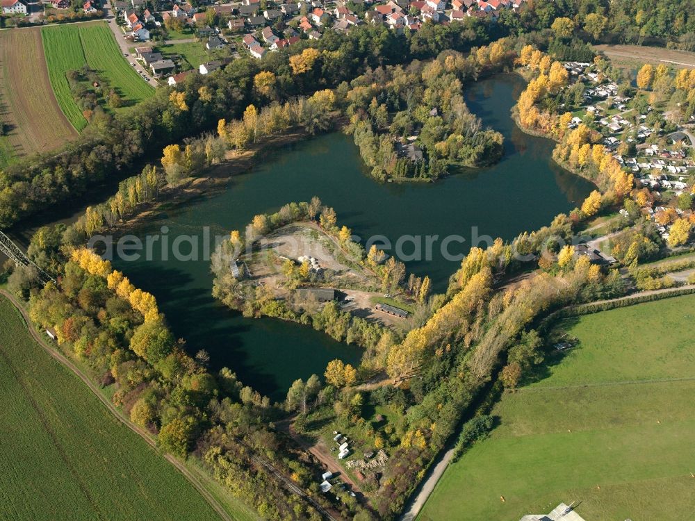 Oedheim from above - Lake Hirschfeldsee and the Sperrfechter Theme Park in Oedheim in the state of Baden-Wuerttemberg. The lake and the park - which also includes camping facilities - are located between the towns of Oedheim and Bad Friedrichshall on the river Kocher