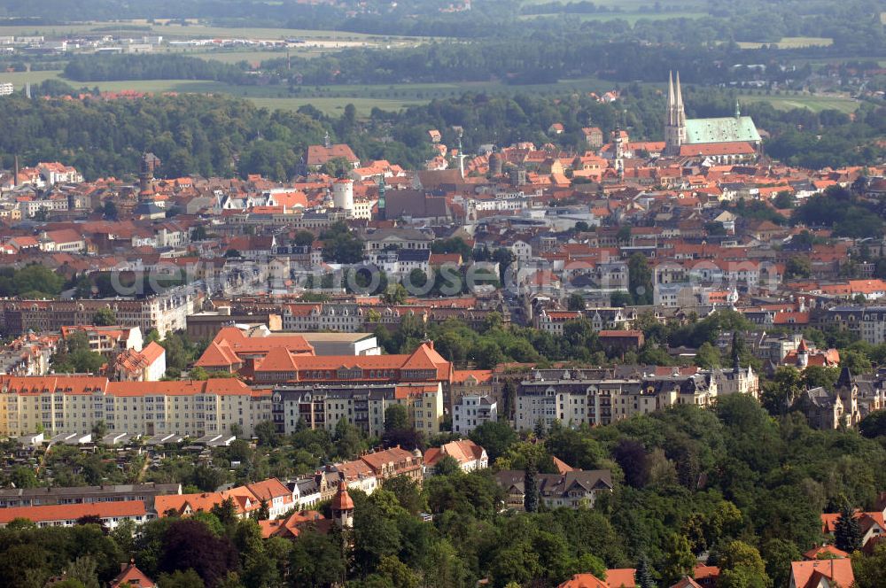 Aerial image Görlitz - Blick auf die historische Altstadt von Görlitz mit dem Wahrzeichen der Stadt, der 1497 fertiggestellten Kirche St. Peter und Paul mit dem weithin sichtbaren Turmpaar. Görlitz ist die östlichste Stadt Deutschlands und liegt in der Oberlausitz an der Lausitzer Neiße, die hier seit 1945 die Grenze zu Polen bildet. Der östlich der Neiße gelegene und wesentlich kleinere Teil der Stadt wurde durch die Grenzziehung in den Jahren nach dem Zweiten Weltkrieg abgetrennt und bildet seitdem die eigenständige polnische Stadt Zgorzelec. Mit 3500 größtenteils restaurierten Baudenkmälern weist sie eines der besterhaltenen historischen Stadtbilder in Deutschland auf und bildet das größte Flächendenkmal Deutschlands.